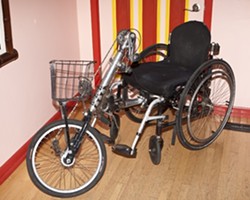 FREEDOM MACHINE :  The late Greg O&rsquo;Kelly&rsquo;s specially designed hand-pedaled wheelchair is up for grabs. - PHOTO BY STEVE E. MILLER