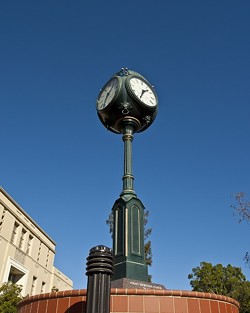BULBOUS:  In an intriguing takedown of the Volny Heritage Clock, which stands on the corner of Osos and Monterey Streets, political science major Lily Meryash humorously describes its &ldquo;bulbous clock head&rdquo; which &ldquo;shoots up petrified as if caught somewhere it knows it&rsquo;s not supposed to be.&rdquo; - PHOTO BY STEVE E. MILLER