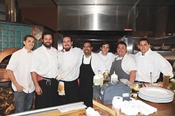 EMBER A-TEAM:  (l-r) The Ember team includes Brian Claiborne, executive chef Collins, sous chef David Marks, Adam Aguillon, pastry chef Matt Molacek, Treaver Lynch, and David Kullman. - PHOTO BY DAN HARDESTY