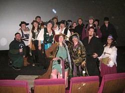 MOTLEY CREW:  About two dozen pirates and assorted pirate-friendly locals volunteered to pull off the fundraiser for Enhancement, Inc. - PHOTO BY RYAN MILLER