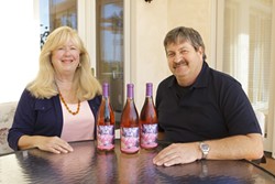 ROSEY FUTURE :  Maurice and Susie Wedell showcase their Ros&eacute; wine that is produced solely to provide money for breast cancer research. - PHOTOS BY STEVE E. MILLER