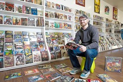 THE DOCTOR IS IN :  Reid Cain is convinced that he can convert non-comic book fans through his new shop in downtown SLO. - PHOTO BY STEVE E. MILLER