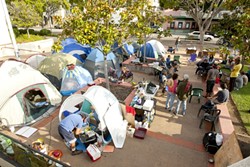 SHANTY OCCUPATION :  After a week of protest, the Occupy SLO movement turned into a transient camp; the steering committee withdrew its support to plan for a more cohesive effort. - PHOTO BY STEVE E. MILLER