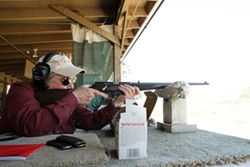 THE BADASS :  Though nearing 70, former U.S. Marine Corp Captain Jo Ann Wheatley is still deadly accurate and passes on her expertise onto other women in Pistol Safety & Handing classes. The former Cal Poly professor is also an NRA Certified Instructor. - PHOTO BY STEVE E. MILLER