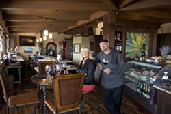 COMFORT AND A VIEW :  One long side of the Bella Vino bar and dining area has an expansive view of the Morro Bay Embarcadero and ocean. Owner Kathy Cohen and GM/Sommelier Aaron Warren will cater to your every need. - PHOTO BY STEVE E. MILLER