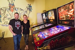 BE EXCELENT, EAT EXCELLENT:  Mike and Becky Hicks encourage loitering at their neighborhood hangout, Lincoln Market. Drink a beer, grub down, or try your hand at some vintage pinball. - PHOTO BY KAORI FUNAHASHI