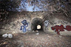 A CONCRETE GALLERY :  Tunnels found along SLO&rsquo;s railroad corridor provide graffiti artists a canvas. - PHOTO BY STEVE E. MILLER