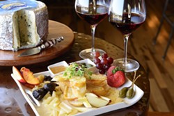 FRESH AND LOCAL :  The Bella Vino signature cheese plate is made up of all locally made cheese and fresh produce. - PHOTO BY STEVE E. MILLER
