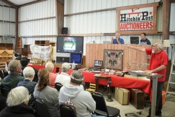 FAST MONEY :  The Erpenbachs have seen a dramatic recent increase in items offered for sale in their family-run auction business. - PHOTO BY STEVE E. MILLER