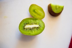 JUST ONE MORE:  Grown on Mallard Lake Ranch in west Nipomo, Bob Criswell&rsquo;s kiwifruit is sweet, tangy, juicy, and totally addictive. - PHOTO BY KAORI FUNAHASHI
