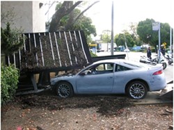 NOT A SCHEDULED STOP :  This vehicle slipped from its restraints on a flat-bed truck and careened into a bus stop, causing roughly $5,000 in damages. - PHOTO COURTESY OF SAN LUIS OBISPO POLICE DEPARTMENT