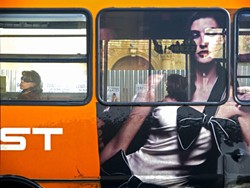 RIDE ALONG:  Dwyer captures the striking image of a girl on a bus in "Bus Girl." - PHOTO BY GARY DWYER