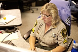 VETERAN :  Senior Dispatcher Kelly Fontes has been on the job for 15 years. - PHOTO BY STEVE E. MILLER