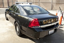 GANG BUSTERS :  As the Sheriff&rsquo;s Department amps up its anti-gang enforcement, one of its strategies is to increase its community presence, namely from behind the wheel of its new marked Chevy Caprice. - PHOTO BY STEVE E. MILLER