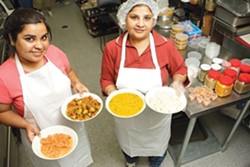STARS OF INDIA :  Neelie Jaggi (left) and Deepika Jaggi offer savory midday meals for delivery to customers on a budget who savor fare faithful to Mumbai tradition. - PHOTO BY STEVE E. MILLER