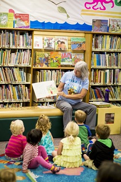 TALES FOR TOTS:  Summertime reading is a good way to prevent kids from forgetting what they learned during the school year. - PHOTO BY HENRY BRUINGTON
