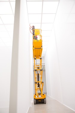 Jeff Jamieson works on Robert Irwin&rsquo;s installation piece Double Blind at Secession in Vienna, Austria. - PHOTO BY DEBORAH DENKER