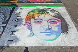 DOUBLE FANTASY:  The street painting festival attracts varied and vibrant works of art like last year&rsquo;s entry from Cannon Corp., a stunning, rainbow John Lennon. - PHOTO BY JOSEF KASPEROVICH