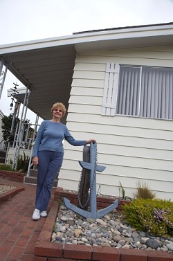 UNMOVING MOBILE :  At Sea Oaks in Los Osos, residents like Marie Pounders have become involved in the politics of protecting their homes. - PHOTO BY JESSE ACOSTA