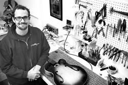 STRINGS ATTACHED :  Butch Boswell, owner of Butch's Guitar Repair in the Creamery, has been mending guitars, banjos, mandolins, and more for more than a decade on the Central Coast. - PHOTO BY MEGAN MASTACHE
