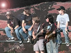 YOUNG ROCK GODS :  Refuge, a rock quintet comprised of 12- to 14-year-old middle schoolers, plays Arroyo Grande's Rock n Dog on Sept. 14. - PHOTO COURTESY OF REFUGE