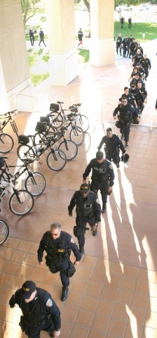 IN STEP :  On Friday afternoon, hundreds of officers met at Cal Poly for a pre-Mardi Gras briefing by SLOPD chief Deb Linden. After Linden&acirc;&euro;&trade;s warm remarks, (&acirc;&euro;&oelig;Be friendly,&acirc;&euro;? she said, &acirc;&euro;&oelig;[but] arrest the people that need arresting.&acirc;&euro;?) the officers reviewed crowd-control tactics. - CHRISTOPHER GARDNER