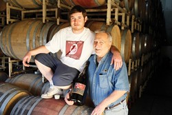 A TIME FOR FAMILY :  Winemaker Ardison Phillips (right) planned on enjoying a traditional Thanksgiving with family and friends. Also pictured is his son, Bailey. - PHOTO BY STEVE E. MILLER