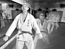 CAN DO :  Koei-Kan Karate-Do owner and instructor Larry Rhodes is celebrating his martial arts dojo's 15th anniversary with plenty of kick. - PHOTO BY STEVE E. MILLER