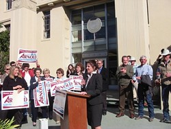 ARNOLD ANNOUNCES :  Flanked by supporters, Debbie Arnold announced her plans to run for the 5th District supervisor seat at a Jan. 11 rally on the steps of SLO's Old Courthouse. - PHOTO BY PATRICK HOWE