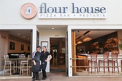 AMERICAN DREAM:  Flour House Owners Alberto and Gessica Russo take a break from making pasta and pizzas at their new restaurant, which celebrated its grand opening late last month. - PHOTO BY DYLAN HONEA-BAUMANN