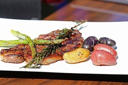 STEAK AT A SUSHI JOINT?:  This rosemary rubbed steak plated with fingerling taters and fresh asparagus offers up a meaty counterpoint to a menu chock-full of light sushi and sashimi. - PHOTO BY DYLAN HONEA-BAUMANN