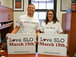 VOLUNTEERS WANTED:  Chris Blake and Stephanie Buresh took the lead on bringing Love SLO to San Luis Obispo. On March 19, hundreds will participate in a day of volunteering throughout the community. - PHOTO BY DYLAN HONEA-BAUMANN
