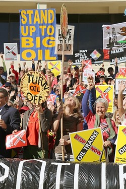 ENTRENCHED OPPOSITION:  Protesters rally against oil trains at a SLO County Planning Commission hearing on the Phillips 66 rail spur project earlier this year, and they still haven&rsquo;t changed their minds. - FILE PHOTO BY DYLAN HONEA-BAUMANN