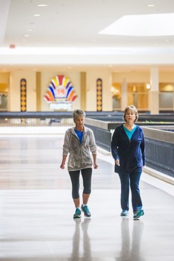 INDOOR ACTIVITY:  Linda Schnell (left) and Shirin Reed (right) walk the wings of the Santa Maria Town Center together regularly, where they can enjoy an active trek free from the elements. - PHOTO BY JAYSON MELLOM