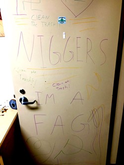 VANDALIZED:  In February, a student&rsquo;s Poly Canyon Village apartment door was marked up with hateful messages, the second hate-inspired crime of the school year. - PHOTO COURTESY OF MATT KLEPFER