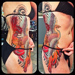 SUN&rsquo;S OUT, TATTOOS OUT:  This colorful bird tattoo by Gary Ellsworth on a client&rsquo;s side can easily be covered up for work and at the pool. - PHOTO COURTESY OF GARY ELLSWORTH