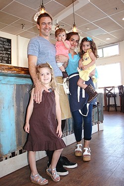 BUSY BEES:  Red Bee Coffee owners Crosby and Miria Moreton stop for a coffee break with daughters Eliya, 5; Levia, 3; and Talya, 1. - PHOTO BY HAYLEY THOMAS CAIN