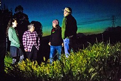 SENSITIVE HABITAT :  Mary Ciesinski, executive director of ECOSLO; Carolyn Huddleston, ECOSLO docent; Heidi Harmon, SLO mayor; and Evan Albright, docent, (left to right) discuss the issue of night hiking at Laguna Lake Park. - PHOTO BY JAYSON MELLOM