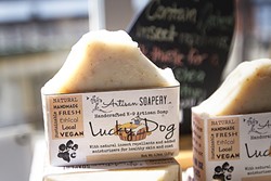 GIVE FIDO A BATH:  Katye Fredieu of Artisan Soapery wants everyone nice and squeaky clean, even the fur babies. The Lucky Dog soap contains milk thistle to give your pup a shiny coat. - PHOTO BY JAYSON MELLOM