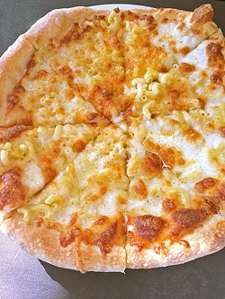 ROOSTER CREEK TAVERN:  While Rooster Creek Tavern&rsquo;s mac &rsquo;n&rsquo; cheese pizza is a creative twist on a traditional dish, it fell short with the heavy use of truffle oil. - PHOTO BY RYAH COOLEY