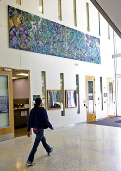 OUT AND ABOUT The Integrated Visionaries mural at Cal Poly's Warren J. Baker Center for Science and Mathematics was inspired by themes of diversity, inclusivity, and community. - PHOTO BY JAYSON MELLOM