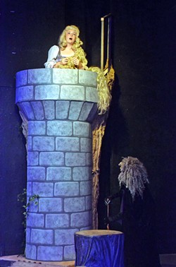 THE GOLDEN STAIRS All alone in her tower, with no company save for visits from her weird mother the witch, is Rapunzel (Olivia Edmonds) with hair as gold as corn. - PHOTO COURTESY OF JAMIE FOSTER PHOTOGRAPHY