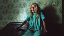 RUN! Janice (Talitha Bateman) becomes the target of a possessed doll. - PHOTO COURTESY OF NEW LINE CINEMA