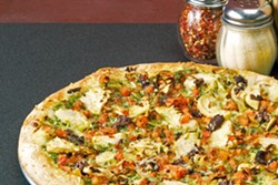NUCCI'S PIZZA Delights like this vegetarian pesto pizza await at Nucci's Pizza. - PHOTO COURTESY OF NUCCI'S PIZZA