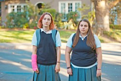 DREAMERS Besties Lady Bird (Saoirse Ronan, left) and Julie (Beanie Feldstein) dream of living in some of the fancy houses they see on their walk home from school. - PHOTO COURTESY OF SCOTT RUDIN PRODUCTIONS