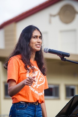 SPEAK OUT San Luis Obispo High School student Minori Jaggia, 17, gives a speech during the March 14 student walkout, when local students joined schools across the country in advocating for change that prevents mass shootings from happening in the future. - PHOTO BY JAYSON MELLOM