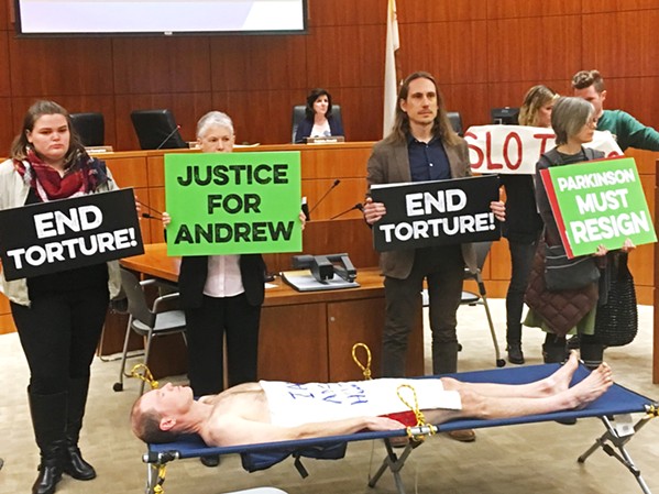PUBLIC OUTCRY The release of video footage of Andrew Holland's death in SLO County Jail resulted in two very public protests, one of which shut down a SLO County Board of Supervisors meeting. - PHOTO BY PETER JOHNSON