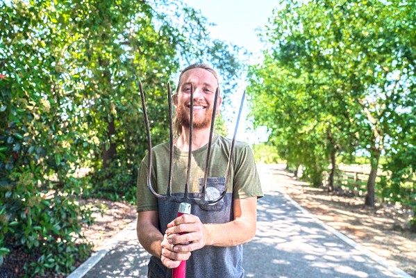 MAKING THE CONNECTION Combining his love for both agriculture and technology, Cam Sluggett created an app that connects farmers and consumers. - PHOTO COURTESY OF ARKITU