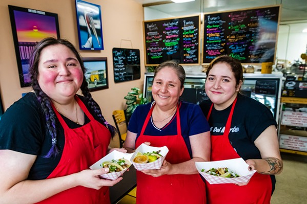 FAMILY RECIPES (From left to right) Viridiana, Matilde, and Jossi Bustos are the women behind the Cayucos Deli's homemade tacos. - PHOTO BY JAYSON MELLOM