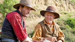 COMEDY ADVENTURE WESTERN? Charlie (Joaquin Phoenix, left) and Eli Sisters (John C. Reilly) are notorious assassins out to kill a gold prospector in 1850s Oregon, in The Sisters Brothers. - PHOTO COURTESY OF ANNAPURNA PICTURES